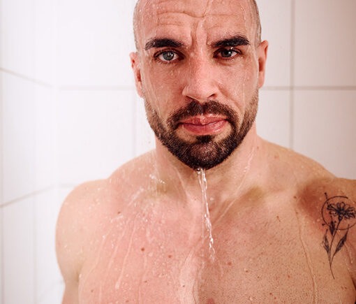 Portrait of a CrossFit athlete in the shower