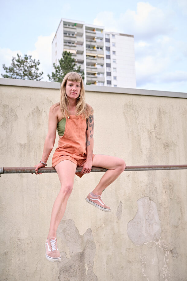 woman doing gymnastics on a pole